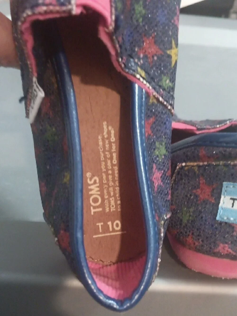 Toms Kids Navy Slip-On Moccasins with Multicolor Star Print and Pink Lining